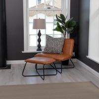 Svea Selo fauteuil met voetenbank - lederlook - cognac