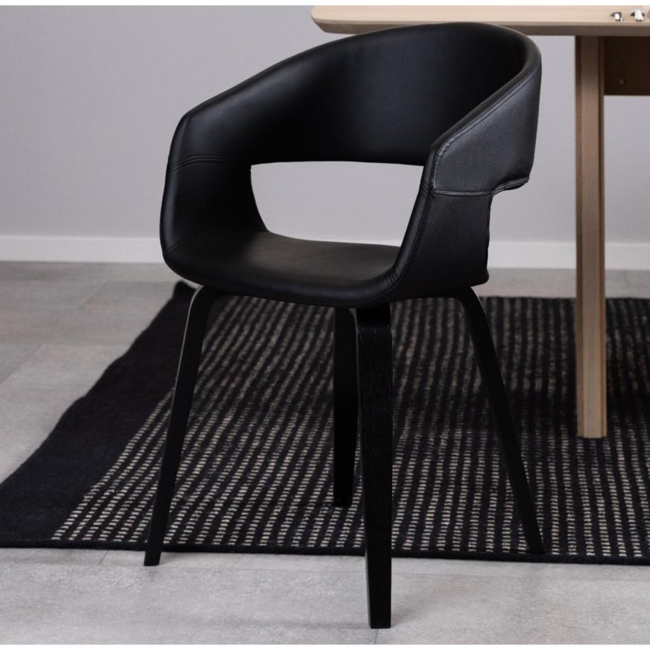 Nøra Peru armstoel | zwart oak onderstel | PU leer - zwart